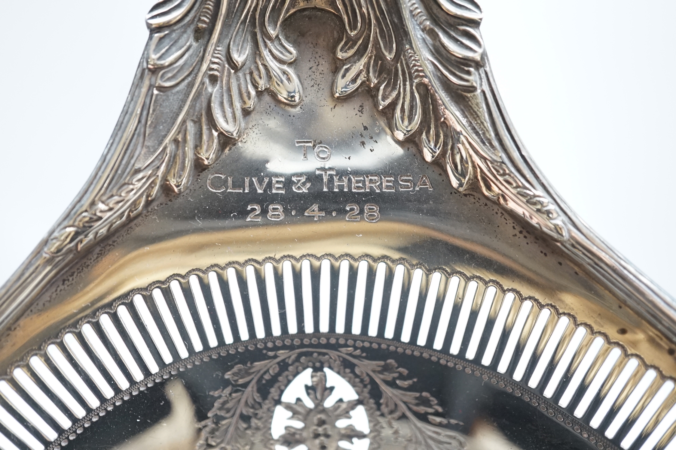 An Edwardian pierced silver two handled oval pedestal dish, with engraved inscriptions, Thomas Bradbury & Sons, Sheffield, 1907, 36.9cm, 18.8oz.